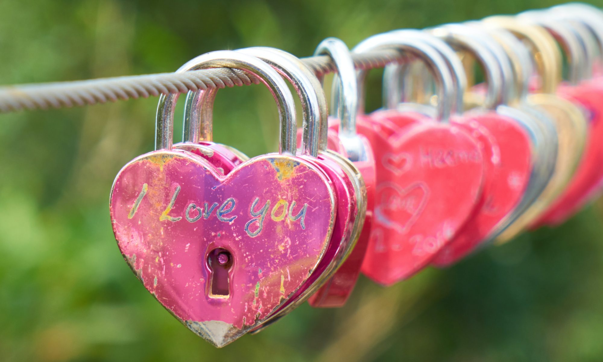pink-red-heart-shaped-i-love-you-locks-hang-on-cable-engin-akyurt-on-unsplash