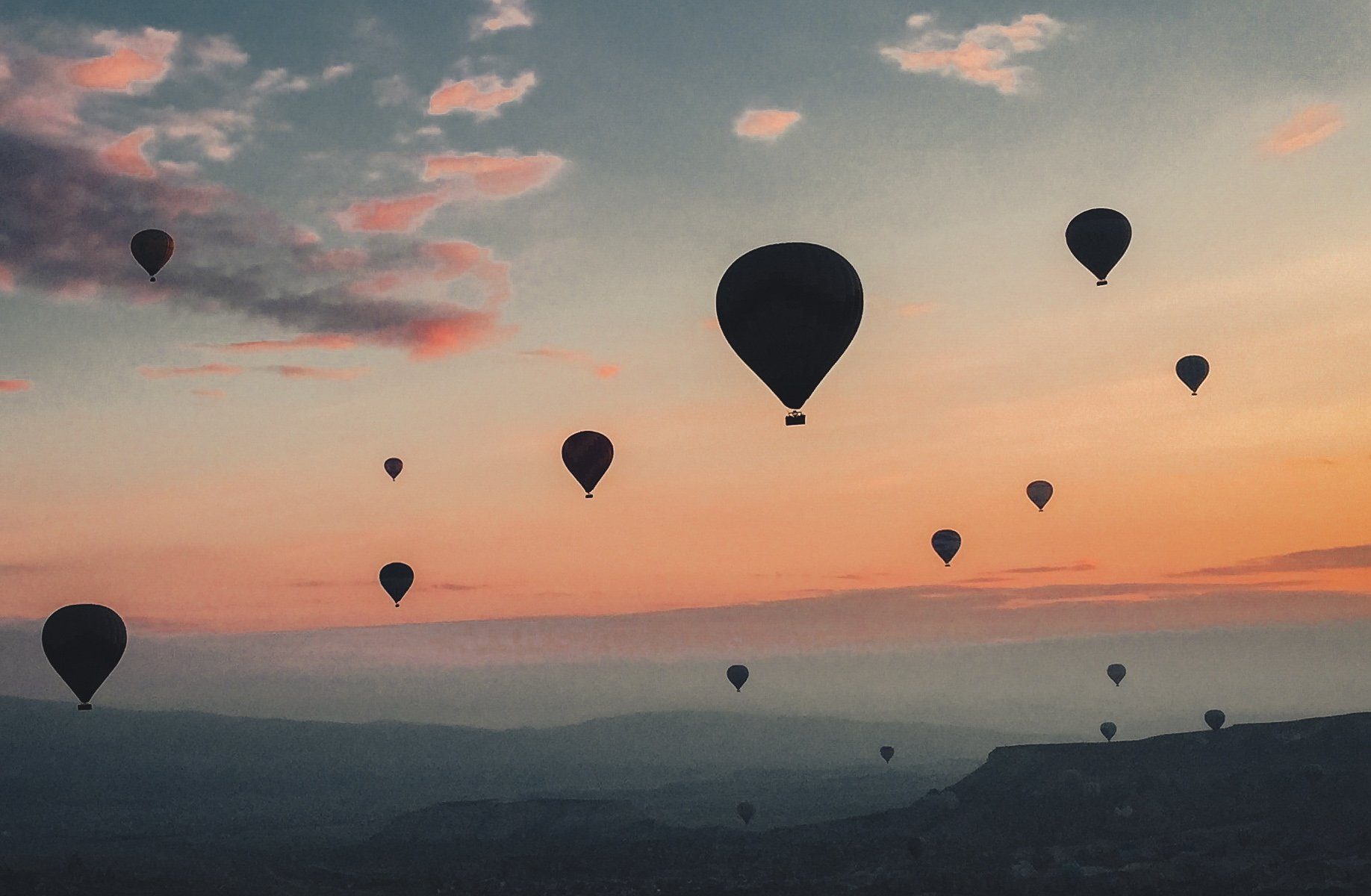 hot-air-balloons-float-at-sunrise-by-burhanuddin-abuwala-on-burst