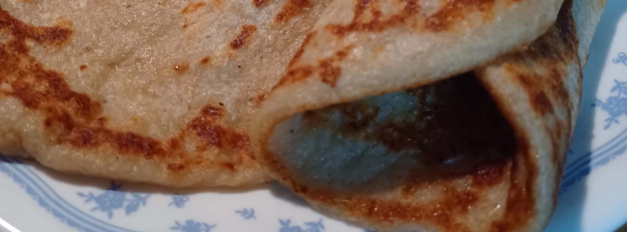 potato-wrap-cake-ready-to-eat-on-blue-white-plate-from-recipe-by-allergy-dragon
