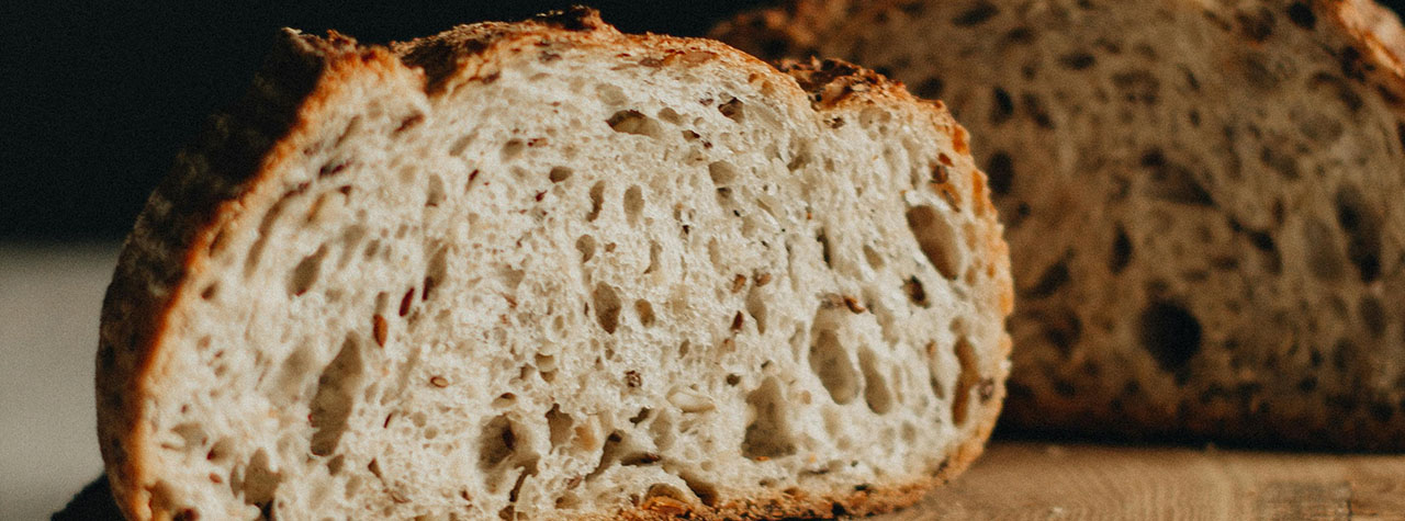 Two loaves of fresh bread. Image by Marta Dzedyshko on Pexels.
